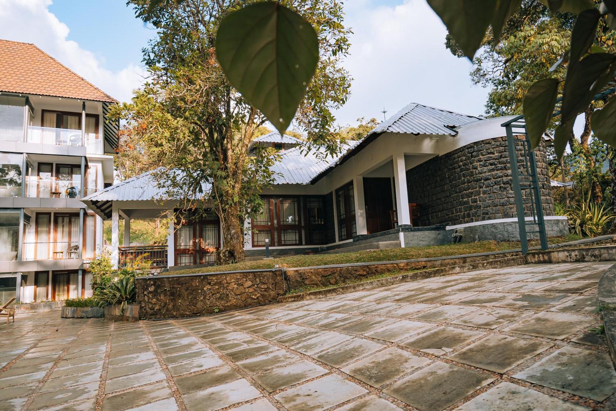 Elixir Woods Luxury Resort And Spa, Munnar Buitenkant foto